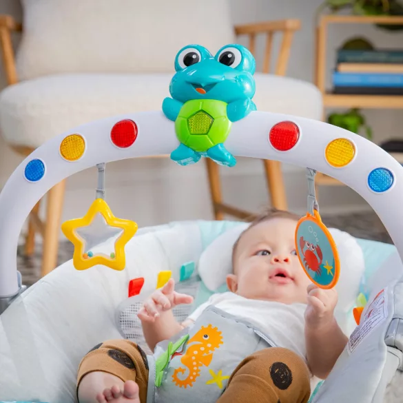 Baby Einstein Hudobné vibračné kresielko so svetielkami Kick to It Neptune do 9 kg