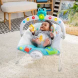 Baby Einstein Hudobné vibračné kresielko so svetielkami Kick to It Neptune do 9 kg