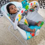 Baby Einstein Hudobné vibračné kresielko so svetielkami Kick to It Neptune do 9 kg