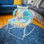 Baby Einstein Hudobné vibračné kresielko Kick to It Opus do 18 kg
