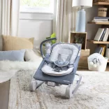 INGENUITY Vibračné masážne kreslo s melódiami, Happy Belly™, Rock-to-Bounce, Chambray, od 0 mesiacov, do 9 kg