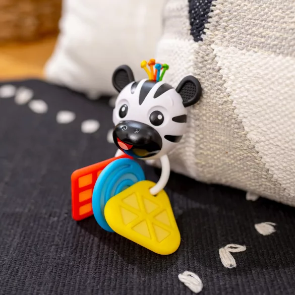 Baby Einstein Hryzátko s hrkálkou zebra Zen™ Shake-a-Shape bez BPA - 0 mesiacov+