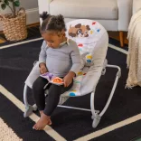 Baby Einstein Hudobné vibračné kresielko Dean's Discovery Spot™ od 0 mesiacov do 9 kg