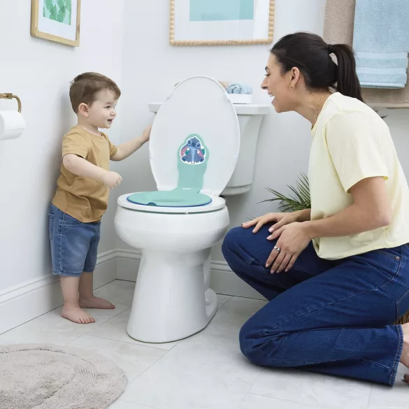 Bright Starts Flip & Sit™ STITCH™ 18m+ nástavec na toaletu, do 23 kg