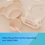 Canpol babies Silikónová zásterka s vreckom – krémová