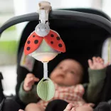 Taf Toys hudobná hračka na kočík s motýlikom 13245
